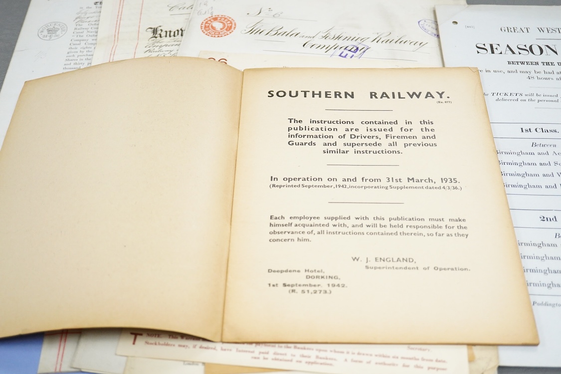 Railway related documents including; a GWR season ticket flyer dated 1854, a Southern Railway instruction booklet for drivers, firemen and guards, share certificates, 1940s and 50s temporary timetables, a Festiniog Railw